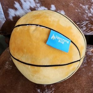 Stuffed basketball by lightning bug pillow?